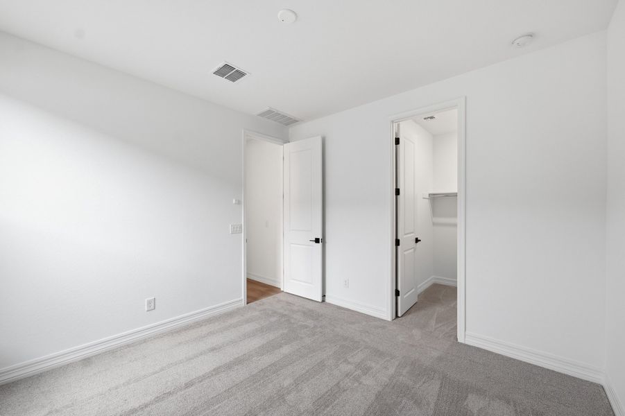Spacious, unfurnished interior of a new home in Artisan at Asante, Surprise (Image 29).