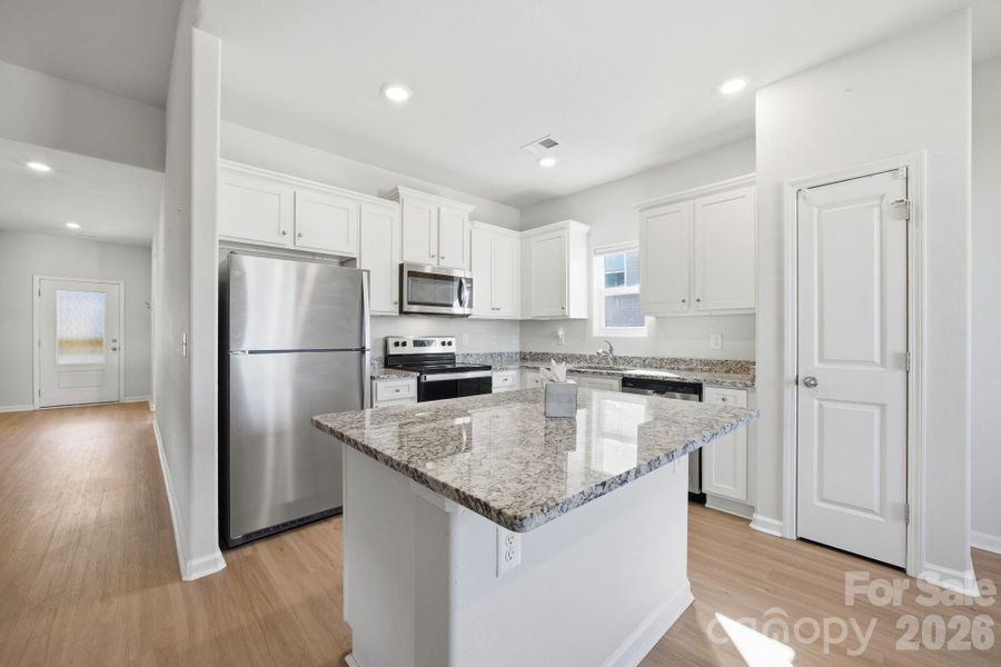 Furnished interior view inside a new home in Stagecoach Station, Gastonia (Image 10).