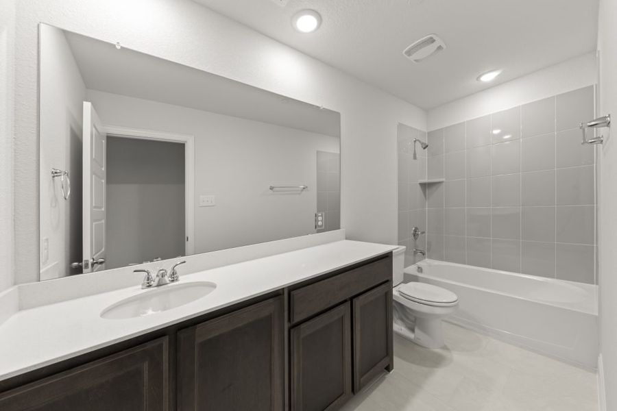 Front exterior of a new home in Sereno Oaks at Buckner Terrace, Dallas, TX, highlighting curb appeal (Image 18).