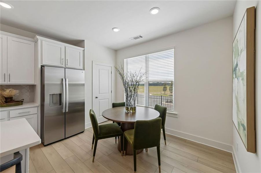 Furnished interior view inside a new home in Tribute, Hoschton (Image 5).