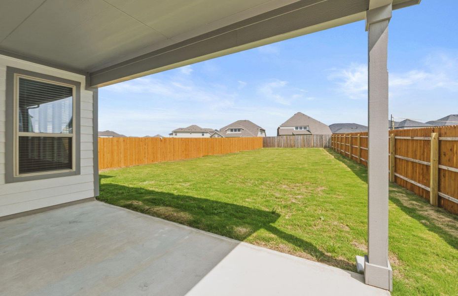 Exterior details and patio area of a home in Santa Rita Ranch, Liberty Hill (Image 19). Exterior details and patio area of a home in Santa Rita Ranch, Liberty Hill (Image 19).