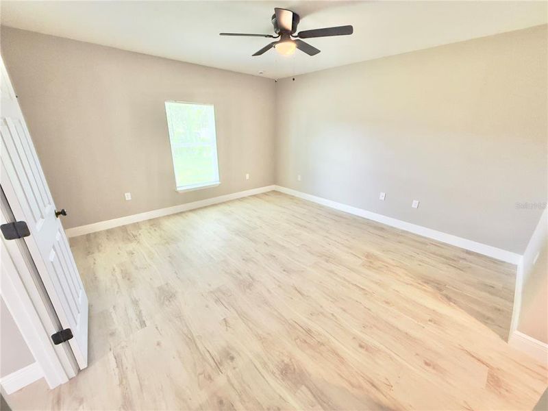 Spacious, unfurnished interior of a new home in , Port Charlotte (Image 19).