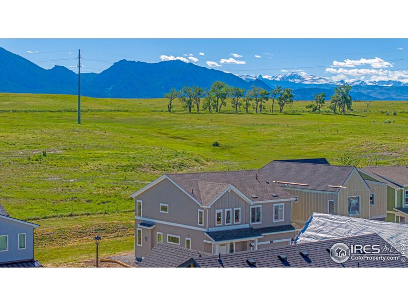 Home backs to Boulder County Open Space and has Mountain views from the living area and 2 of the 5 bedrooms.