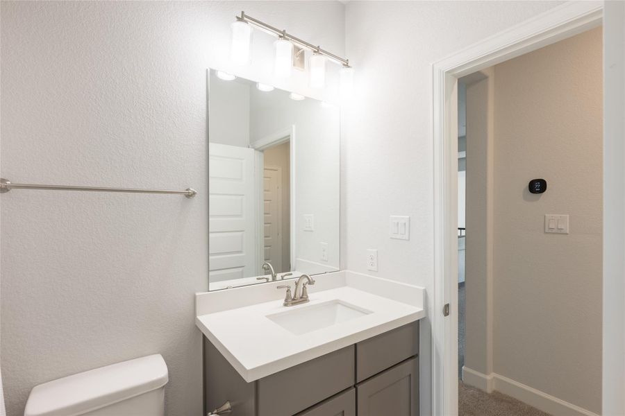 Furnished interior view inside a new home in Elyson, Katy (Image 25).