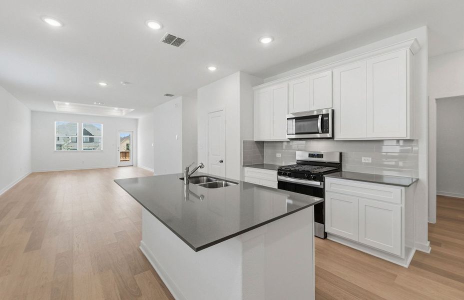 Furnished interior view inside a new home in Sunfield, Buda (Image 9).