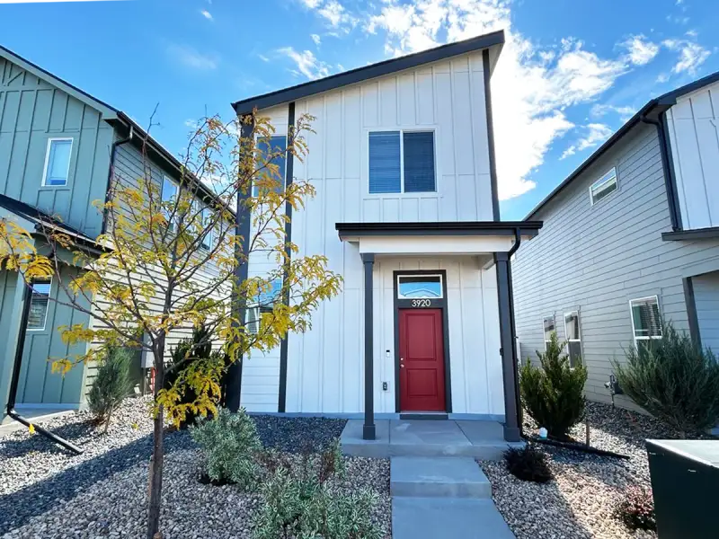 Front exterior of a new home in Liberty Draw, Evans, CO, highlighting curb appeal (Image 2). Front exterior of a new home in Liberty Draw, Evans, CO, highlighting curb appeal (Image 2).