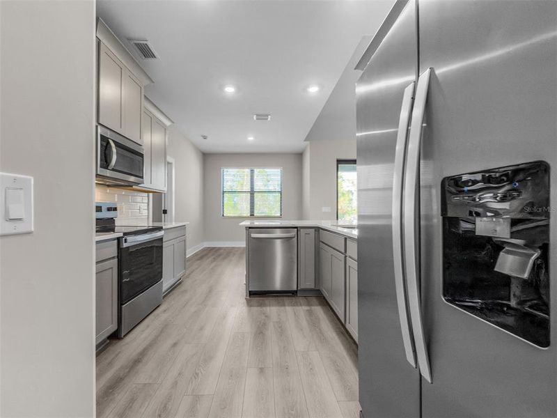 Furnished interior view inside a new home in , Port Charlotte (Image 5).