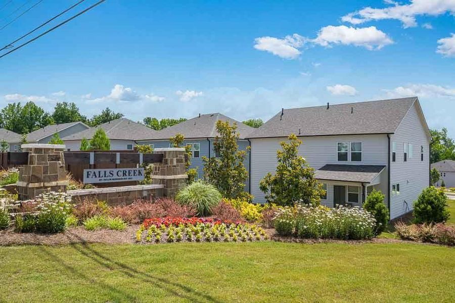 Front exterior of a new home in Falls Creek, Flowery Branch, GA, highlighting curb appeal (Image 1). Front exterior of a new home in Falls Creek, Flowery Branch, GA, highlighting curb appeal (Image 1).