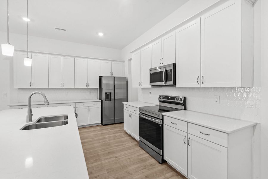 Furnished interior view inside a new home in Long Bay Golf Club, Longs (Image 10).