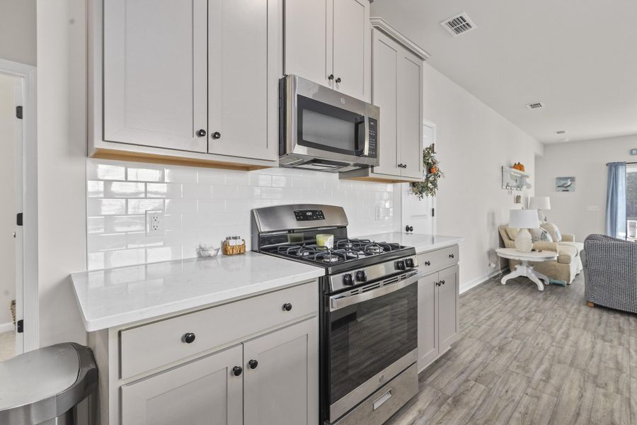 Furnished interior view inside a new home in K. Hovnanian's® Four Seasons at Lakes of Cane Bay, Summerville (Image 17). Furnished interior view inside a new home in K. Hovnanian's® Four Seasons at Lakes of Cane Bay, Summerville (Image 17).