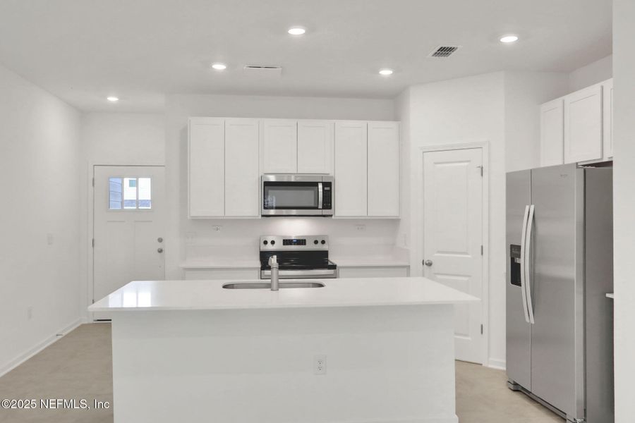 Furnished interior view inside a new home in Atlantis Pointe, Middleburg (Image 11).