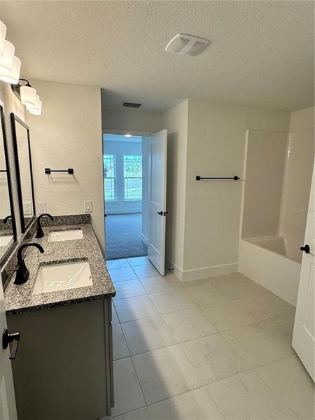 Furnished interior view inside a new home in Watercress Cove, North Port (Image 6). Furnished interior view inside a new home in Watercress Cove, North Port (Image 6).