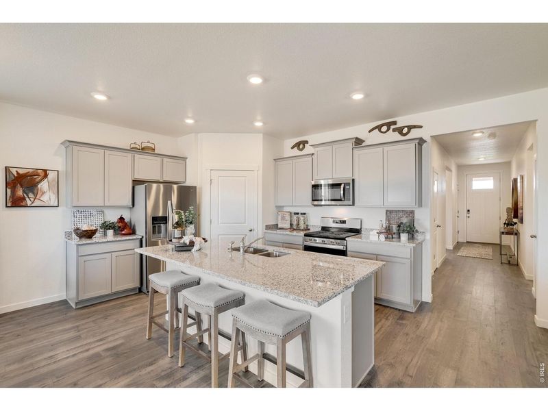 Furnished interior view inside a new home in Fossil Creek Ranch, Windsor (Image 12).