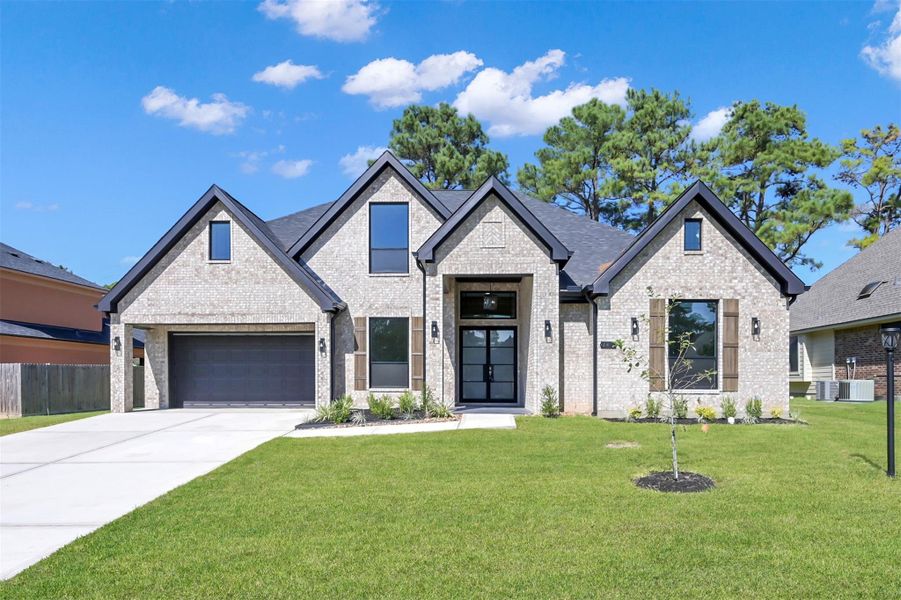 Stunning all-brick exterior with timeless curb appeal and elegant architectural details Stunning all-brick exterior with timeless curb appeal and elegant architectural details