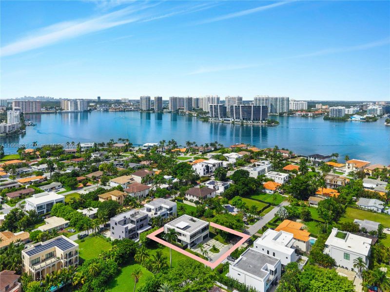 Front exterior of a new home in , Sunny Isles Beach, FL, highlighting curb appeal (Image 21).