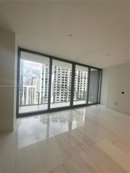 Spacious, unfurnished interior of a new home in Aston Martin Residences, Miami (Image 13).