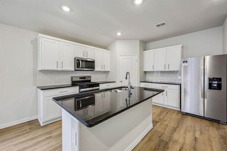 Photo is not of the actual home, but is an inspirational photo of builder’s model home and may depict options, furnishings, and/or decorator features that are not included.