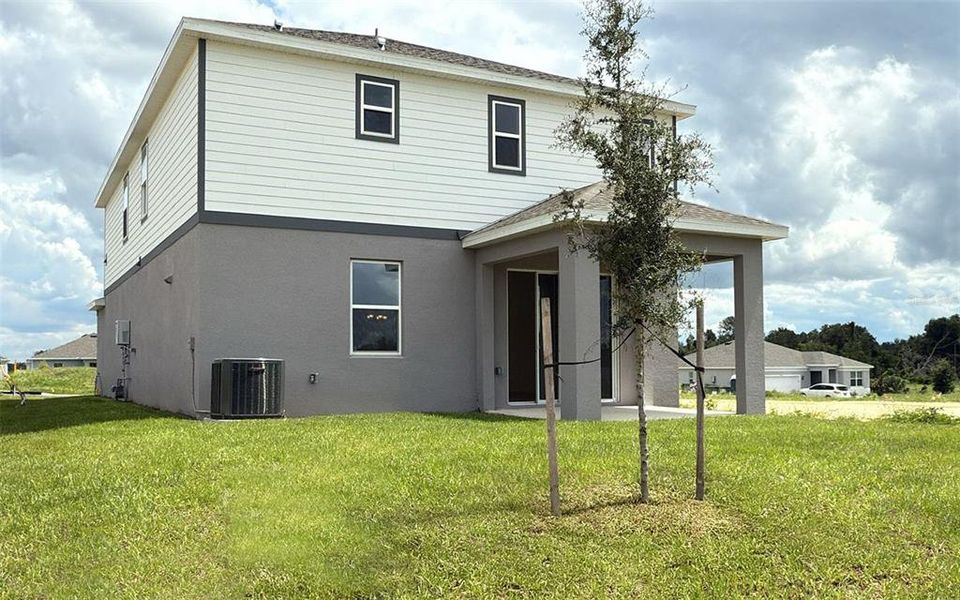Front exterior of a new home in , Howey-in-the-Hills, FL, highlighting curb appeal (Image 16).