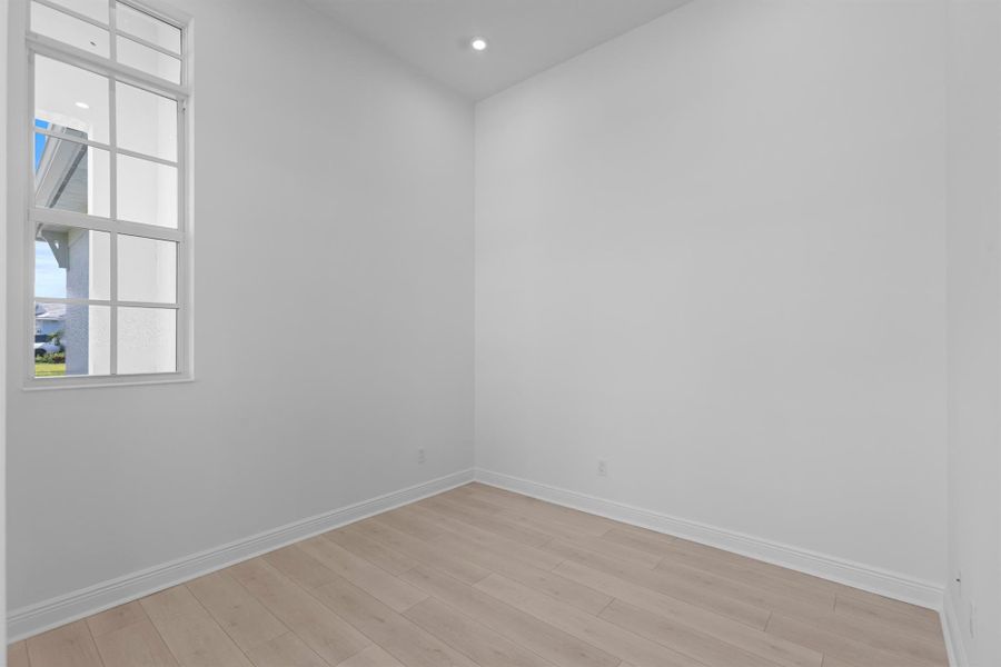 Furnished interior view inside a new home in PGA Village Verano, Port St. Lucie (Image 18).