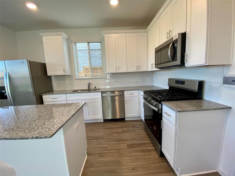Furnished interior view inside a new home in , Cypress (Image 8).