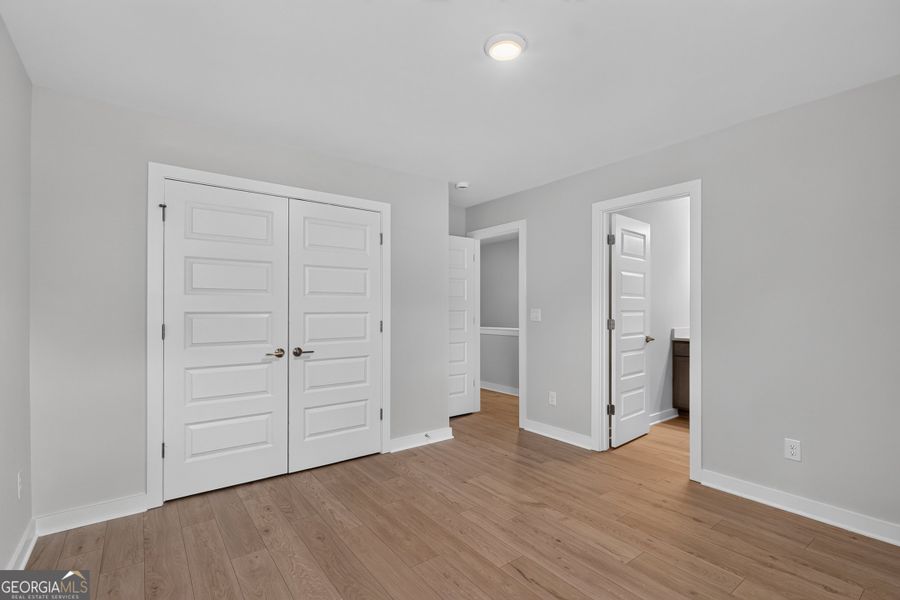Spacious, unfurnished interior of a new home in The Cottages at East Lanier, Fayetteville (Image 16).
