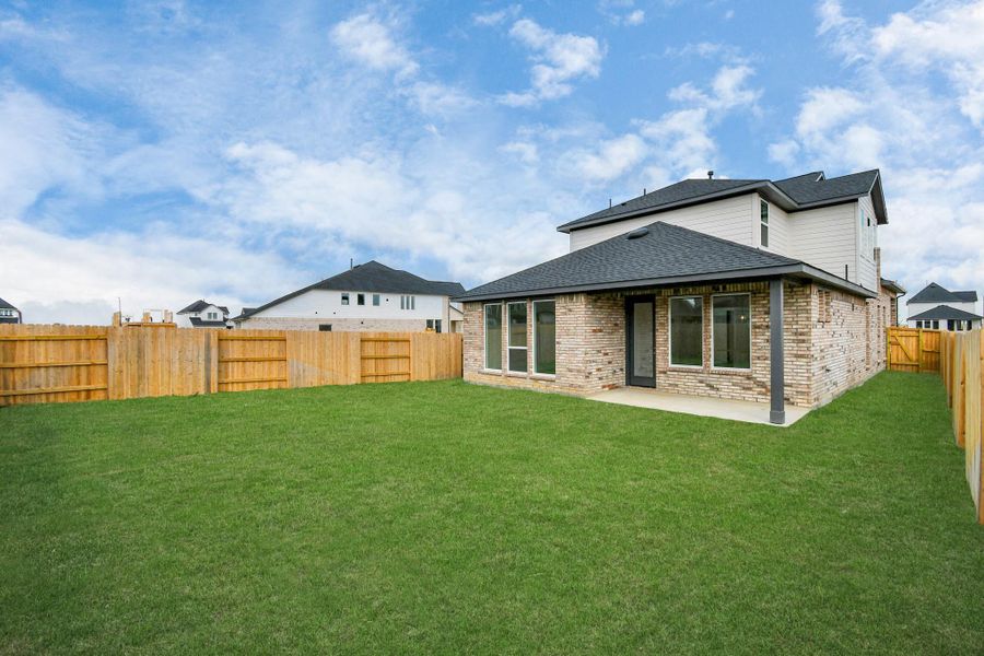 Exterior details and patio area of a home in Elyson, Katy (Image 24).