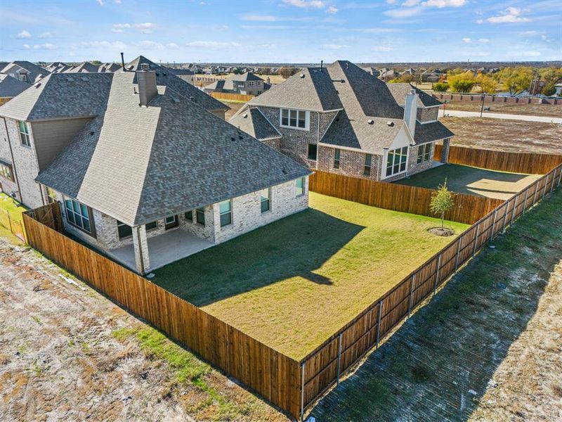 Exterior details and patio area of a home in Stone River Glen, Royse City (Image 3). Exterior details and patio area of a home in Stone River Glen, Royse City (Image 3).