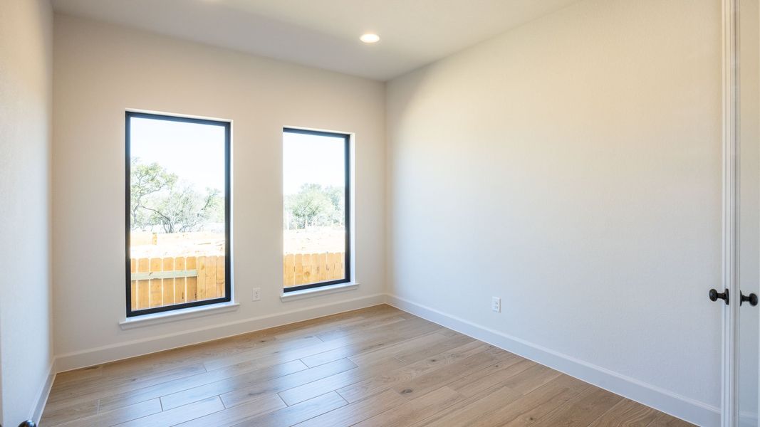 Spacious, unfurnished interior of a new home in Parkside On The River, Georgetown (Image 21).