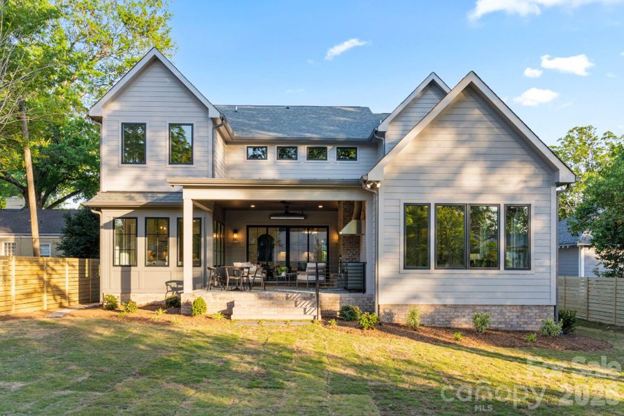 Back of home.  Large Level Private backyard!