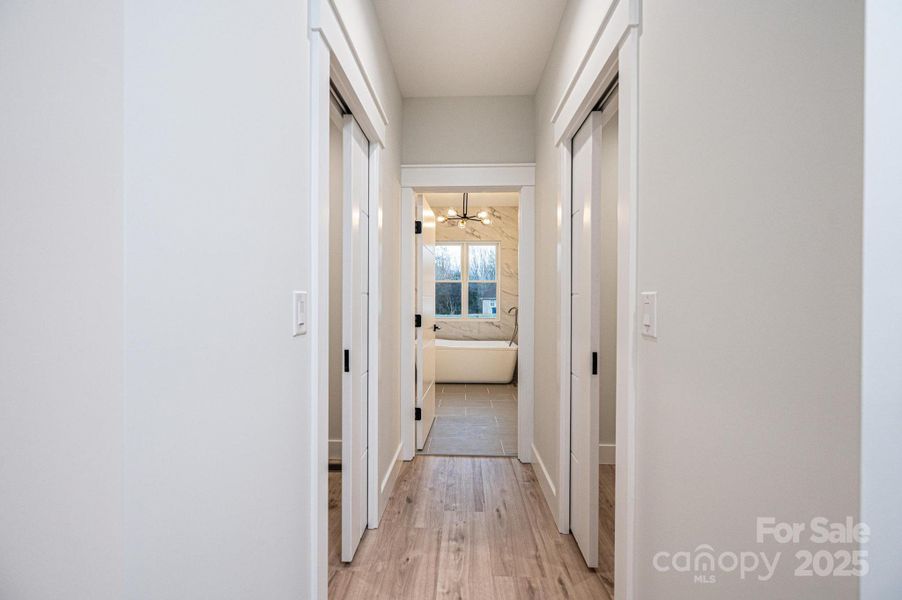 Primary Bedroom, His and Her Walk in Closets and En-Suite Full Bath Primary Bedroom, His and Her Walk in Closets and En-Suite Full Bath