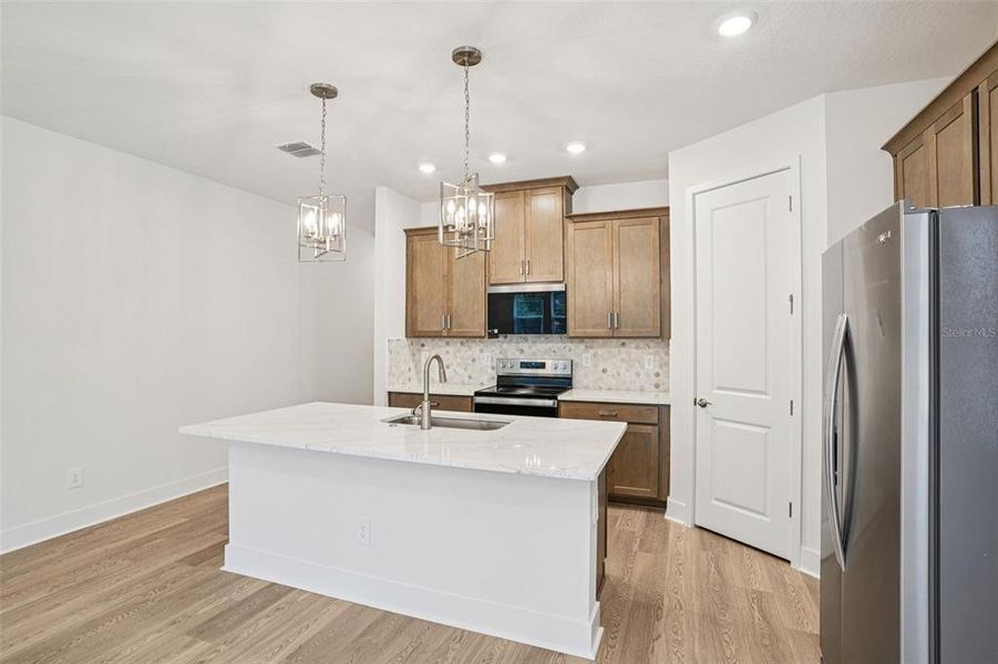 Furnished interior view inside a new home in Ridgehaven - Signature Series, Ormond Beach (Image 4).