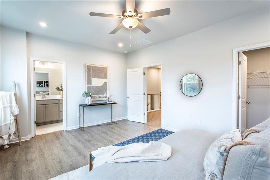 Furnished interior view inside a new home in Towne Village at Suwanee Dam, Sugar Hill (Image 7). Furnished interior view inside a new home in Towne Village at Suwanee Dam, Sugar Hill (Image 7).