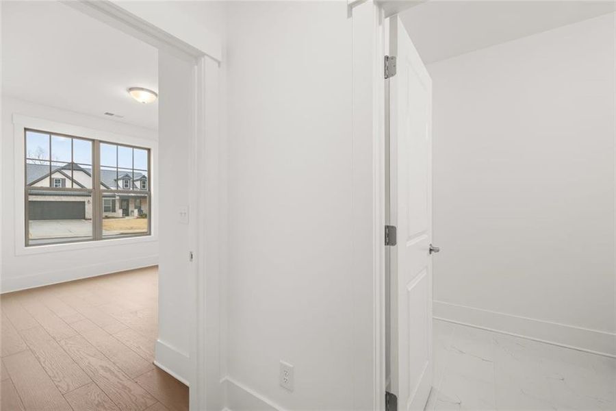 Spacious, unfurnished interior of a new home in Soleil Belmont Park, Canton (Image 40).