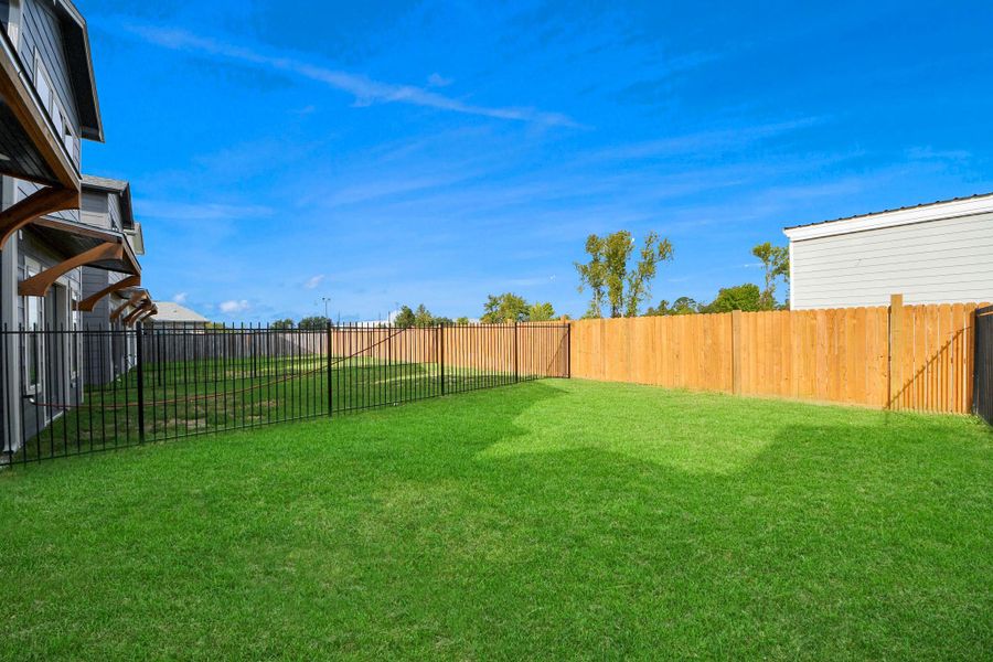 Exterior details and patio area of a home in , Houston (Image 3).