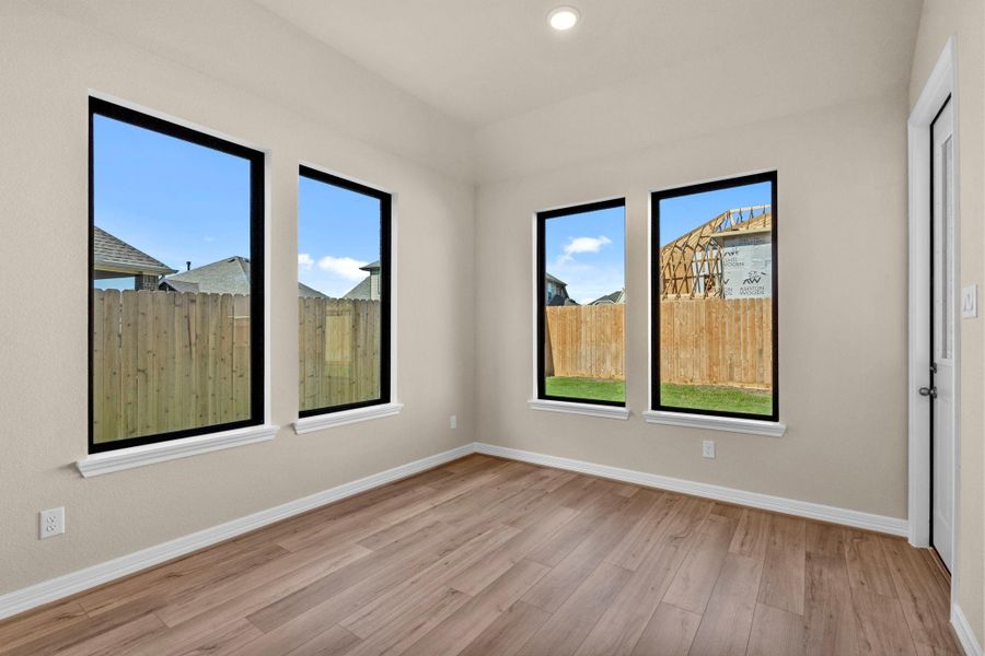 With an abundance of natural light streaming through the windows, the breakfast nook is bathed in a sunny glow, creating the perfect atmosphere to enjoy your morning coffee or a family breakfast. With an abundance of natural light streaming through the windows, the breakfast nook is bathed in a sunny glow, creating the perfect atmosphere to enjoy your morning coffee or a family breakfast.