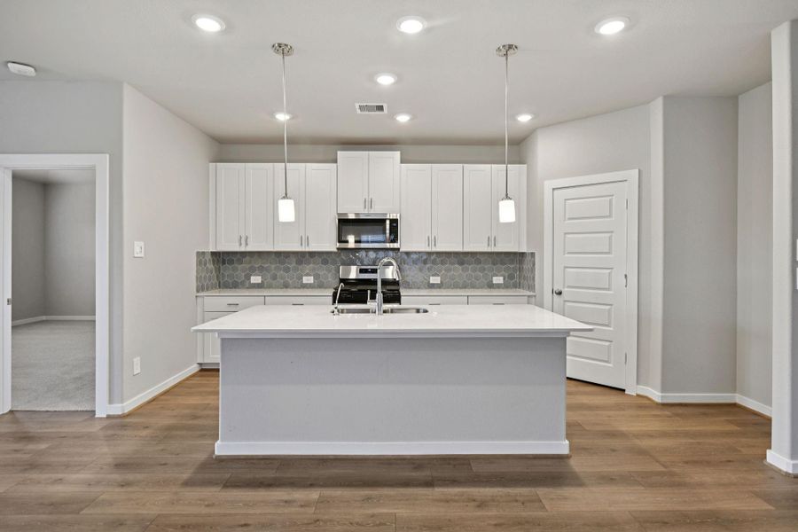 Photo is not of the actual home, but is an inspirational photo of builder’s model home and may depict options, furnishings, and/or decorator features that are not included