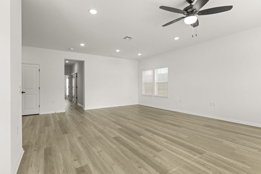 Spacious, unfurnished interior of a new home in Whisper Valley, Manor (Image 13).