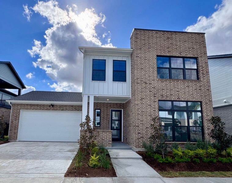 Front exterior of a new home in Easthaven at Bridgeland Central - Vision Collection, Cypress, TX, highlighting curb appeal (Image 17). Front exterior of a new home in Easthaven at Bridgeland Central - Vision Collection, Cypress, TX, highlighting curb appeal (Image 17).