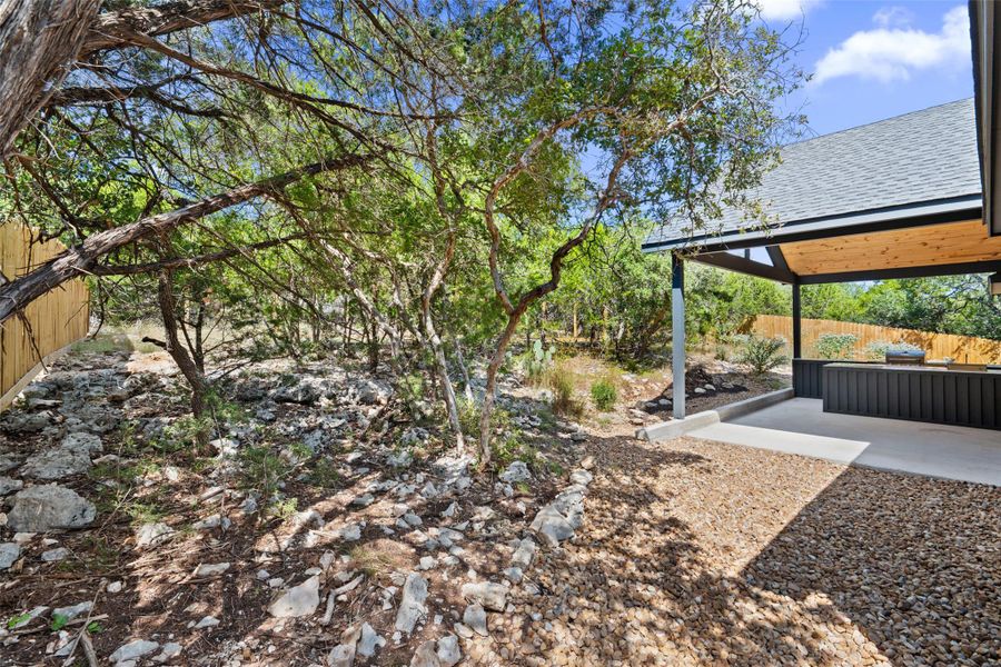 View of yard with a patio area View of yard with a patio area