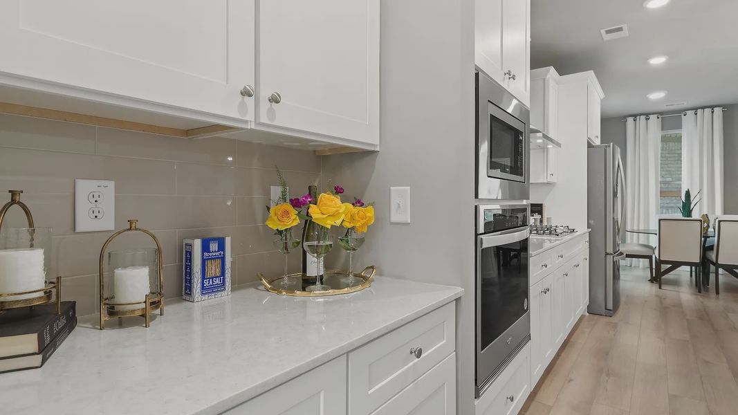 Representative furnished interior of a home built from the Rosemary II by DRB Homes in Northcroft, Loganville (Image 13).