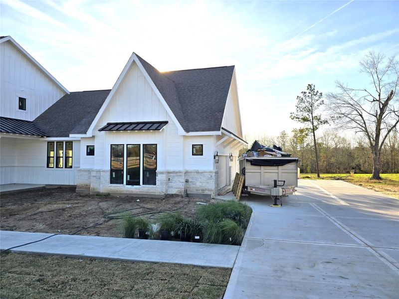 Side view with 3 -4 car garage