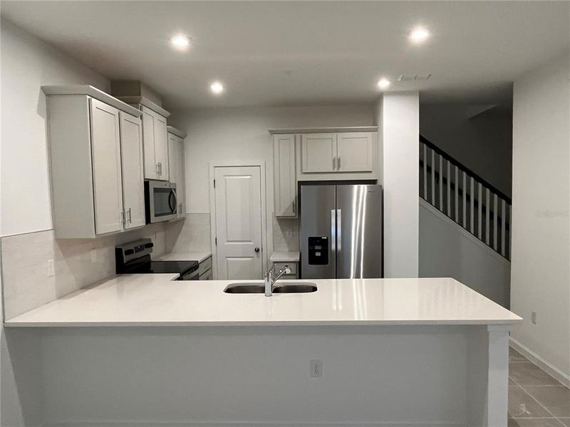 Furnished interior view inside a new home in Meridian Parks, Orlando (Image 12).