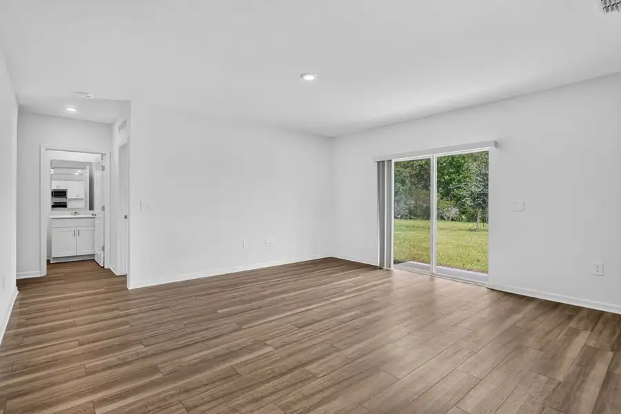 Representative unfurnished interior of a home built from the Kingfisher by Taylor Morrison in Palm Wind, Hudson (Image 22).