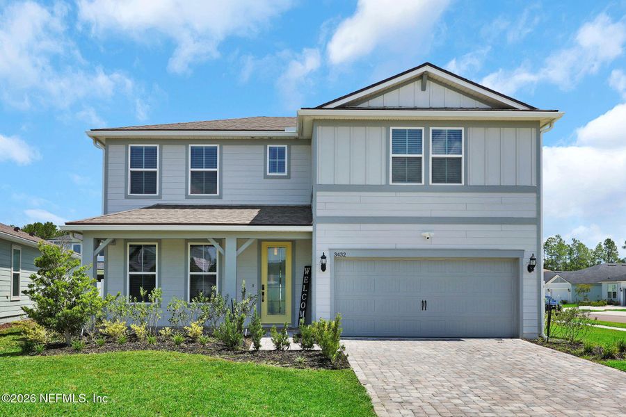 Front exterior of a new home in Double Branch, Middleburg, FL, highlighting curb appeal (Image 2). Front exterior of a new home in Double Branch, Middleburg, FL, highlighting curb appeal (Image 2).