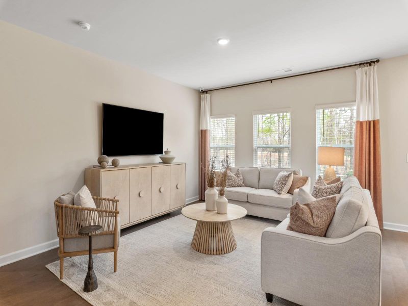 The great room offers an abundance of warm, natural light.