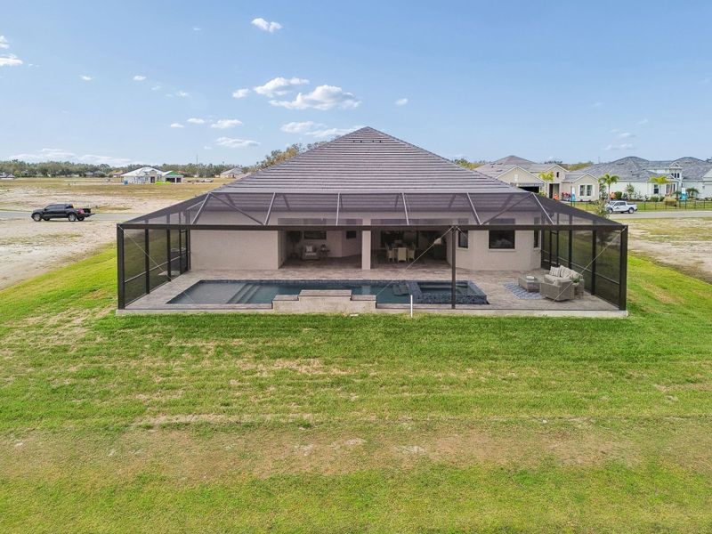 Exterior details and patio area of a home in River Preserve Estates, Parrish (Image 47).
