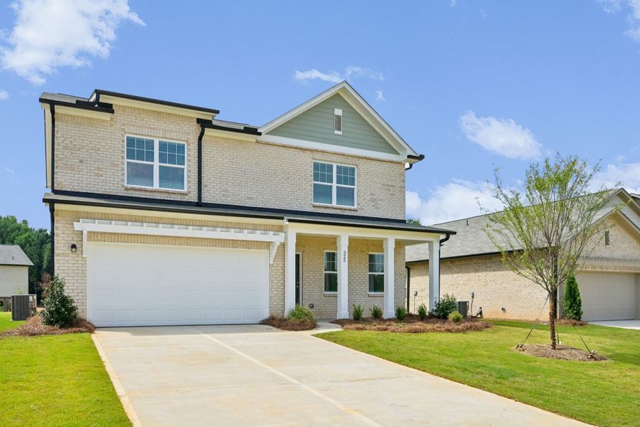 Representative exterior photo of a completed home built from the Beacon by Starlight Homes in Kendall Grove, McDonough, GA (Image 2).