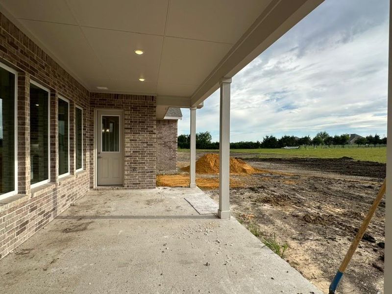 Exterior details and patio area of a home in Fannin Ranch, Leonard (Image 3).