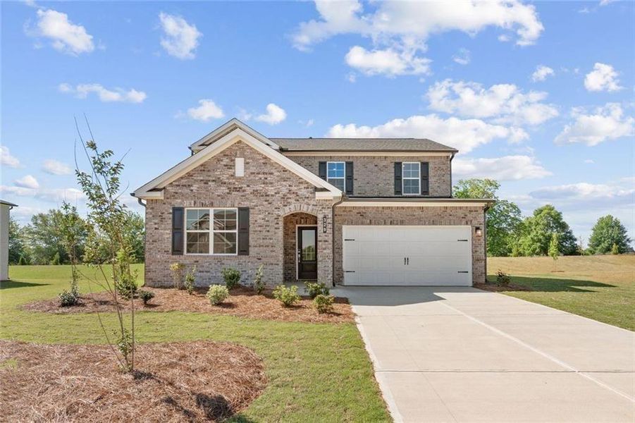 Front exterior of a new home in Walker Grove, McDonough, GA, highlighting curb appeal (Image 22).