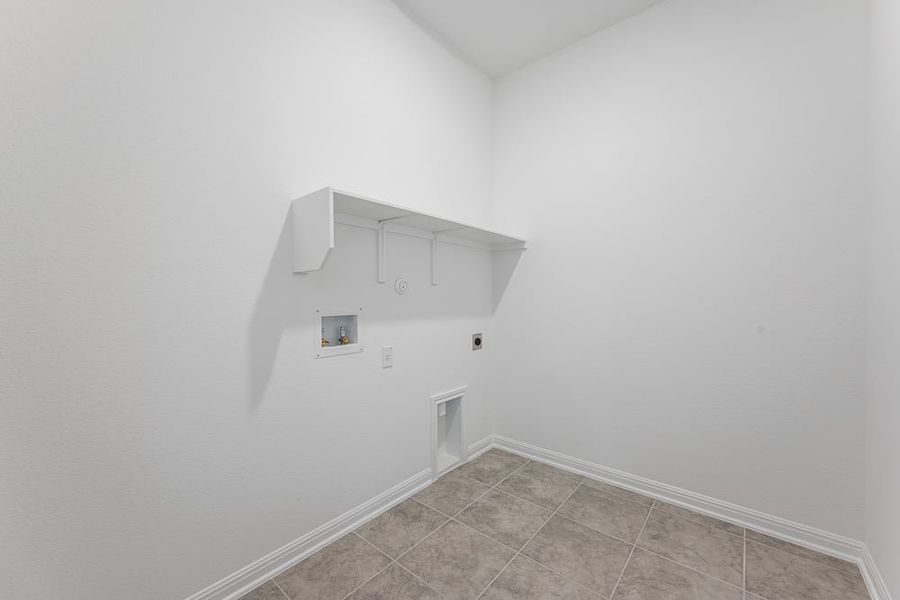 Representative unfurnished interior of a home built from the Wren by Taylor Morrison in Turner's Crossing 50s, Austin (Image 25).